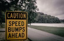 Caution Speed Bumps Ahead sign
